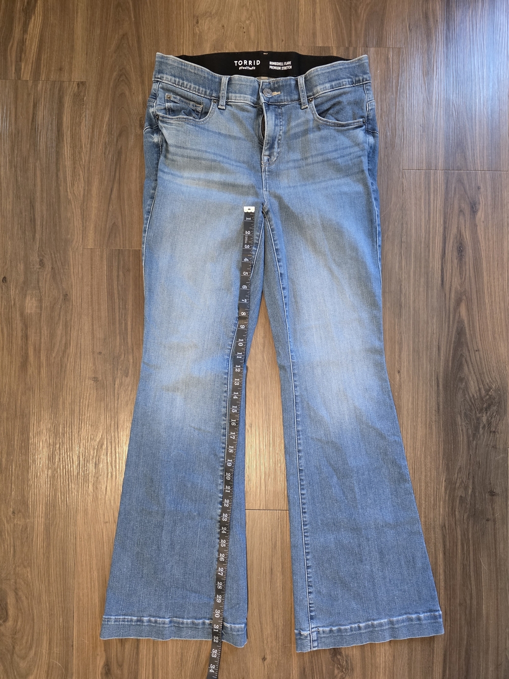 Torrid Bombshell Flare jeans in a light wash with premium stretch denim